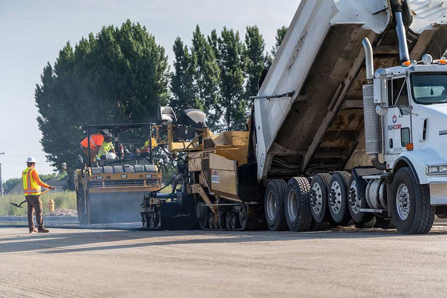 Asphalt Paving crew installing new road