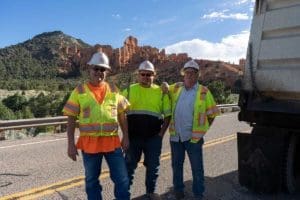 Dump Truck Driver Delivery Crew Hot Asphalt on SR-12 Near Bryce Canyon Utah