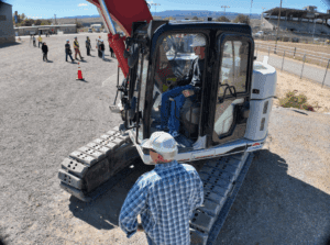 student in construction equipment